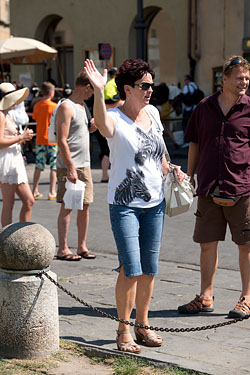 People Posing by The Leaning Tower of Pisa