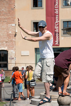 People Posing by The Leaning Tower of Pisa