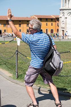 People Posing by The Leaning Tower of Pisa