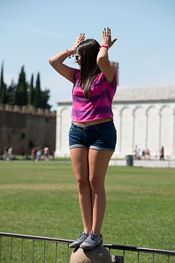 People Posing by The Leaning Tower of Pisa