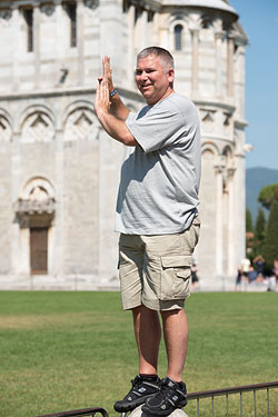 People Posing by The Leaning Tower of Pisa