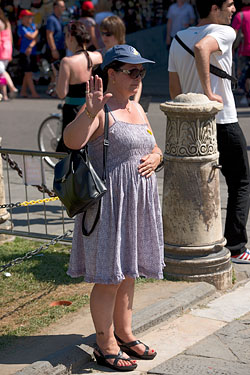 People Posing by The Leaning Tower of Pisa