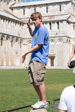 People Posing by The Leaning Tower of Pisa