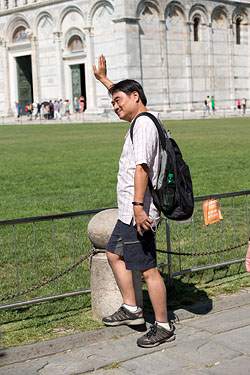 People Posing by The Leaning Tower of Pisa