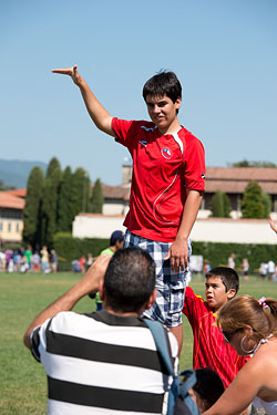 People Posing by The Leaning Tower of Pisa