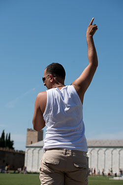 People Posing by The Leaning Tower of Pisa