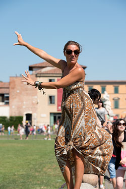 People Posing by The Leaning Tower of Pisa