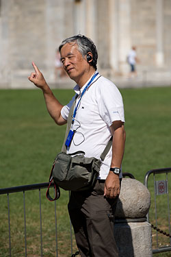 People Posing by The Leaning Tower of Pisa